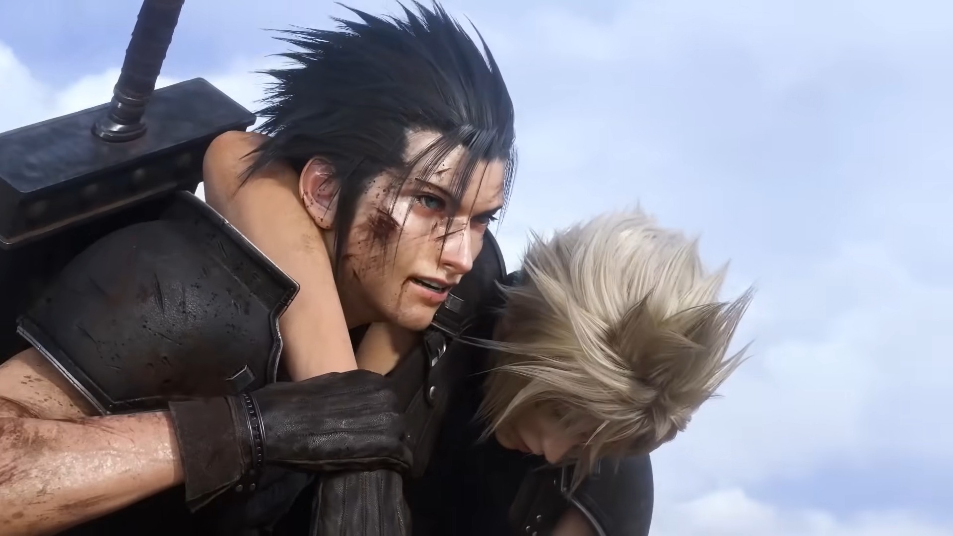 Captura de imagem mostra cena do primeiro trailer de Final Fantasy VII Rebirth, com o personagem Zack Fair, de rosto sujo e ensanguentado, carregando o amigo desmaiado Cloud Strife