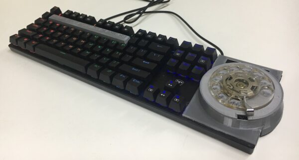 Teclado com disco de telefone