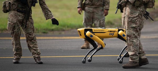 An RAF Leeming Airman interacts with a new Boston Dynamics Spot robot during Agile Liberty 21-2, Aug 25, 2021. The 48th Fighter Wing regularly conducts joint exercises with UK forces in order to demonstrate and improve our interoperability and Agile Combat Employment capabilities which includes using new technologies to increase their effectiveness. (U.S. Air Force photo by SrA John Ennis)