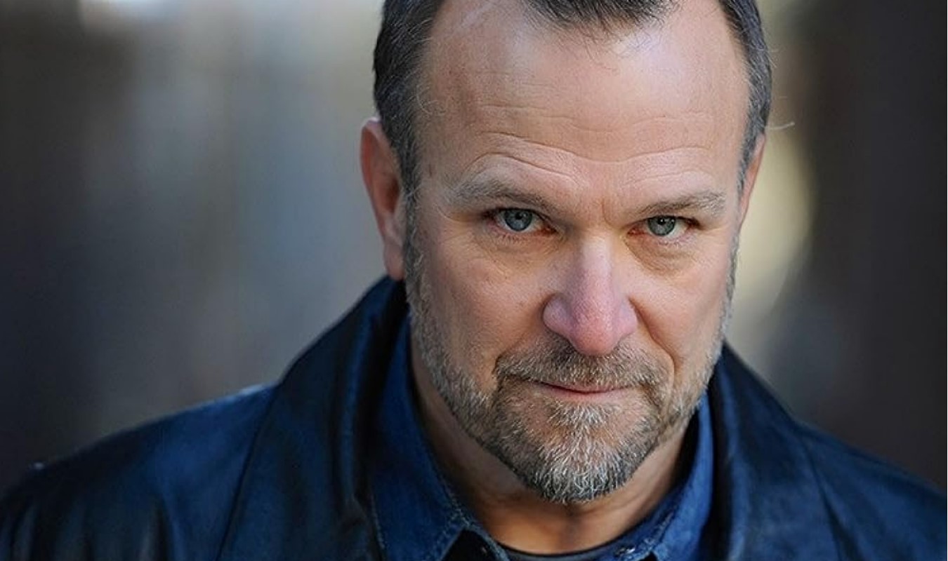 Imagem mostra o ator Ned Luke, de GTA V